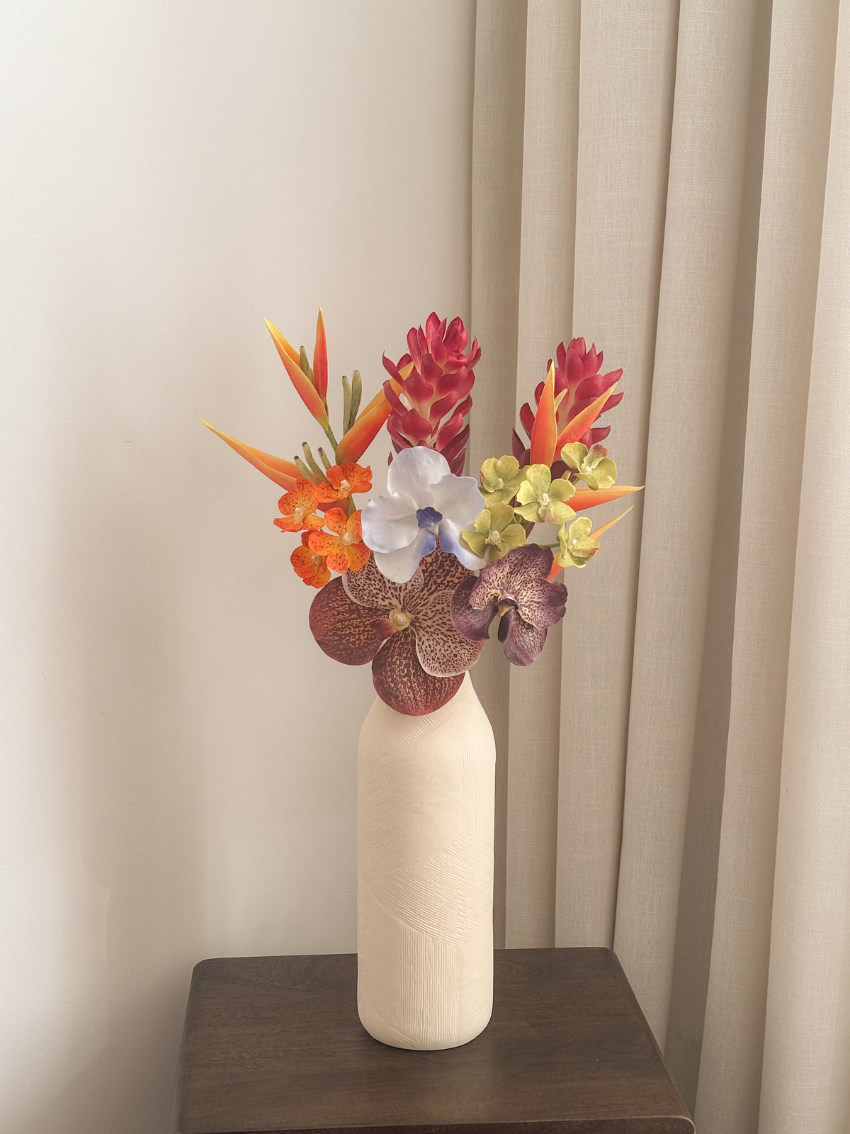 Tropical artificial flower arrangement with vanda orchids, bird of paradise and red ginger by FAUX Dubai