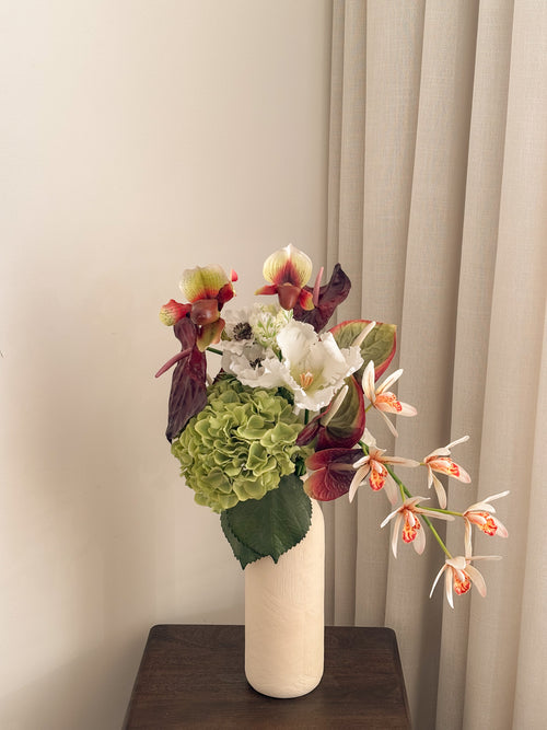 Faux sage hydrangea, white anemone and orchid garden arrangement by FAUX Dubai