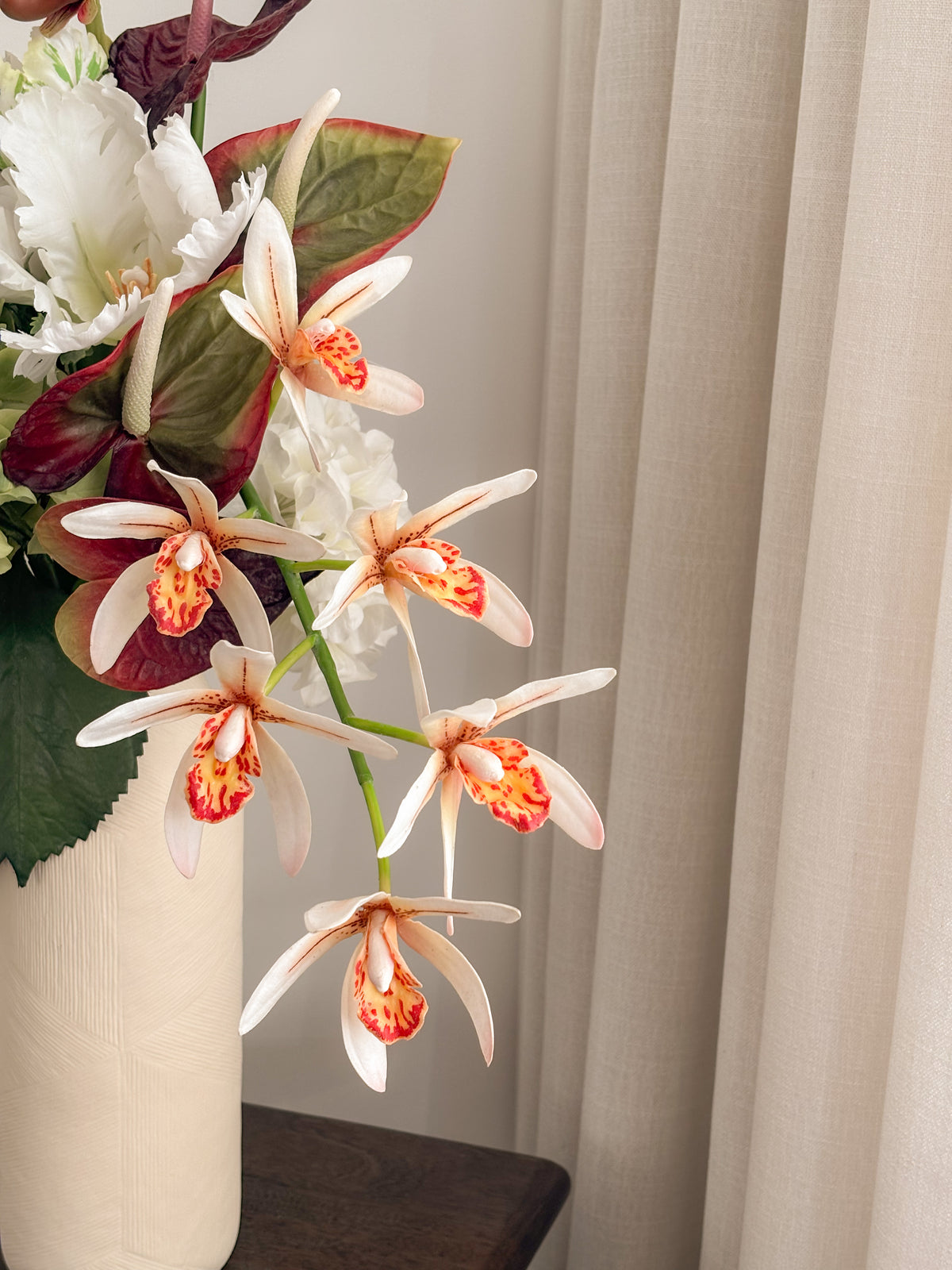 Detail view: faux hydrangea and orchid garden arrangement by FAUX Dubai