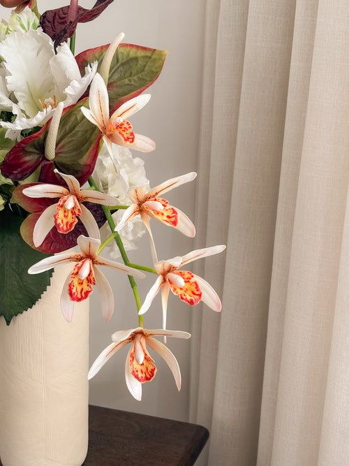 Detail view: faux hydrangea and orchid garden arrangement by FAUX Dubai