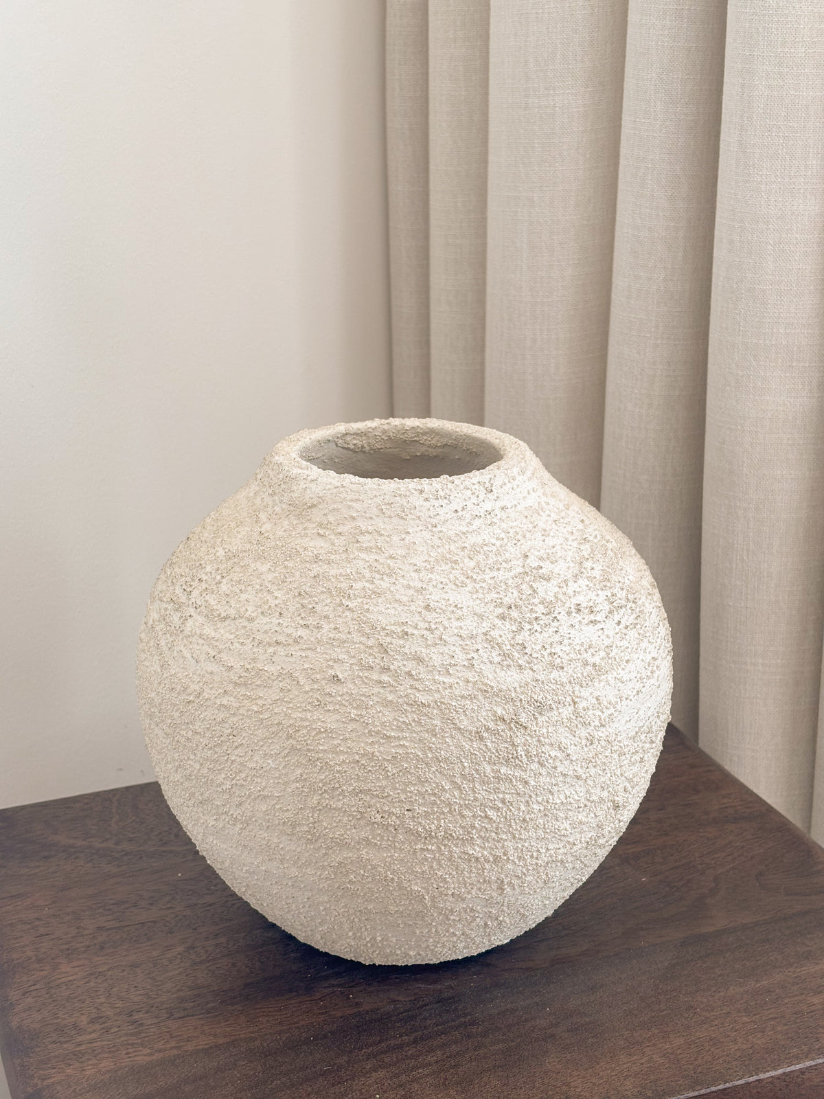 Textured volcanic ceramic globe vase, Vase Volcane by FAUX Dubai