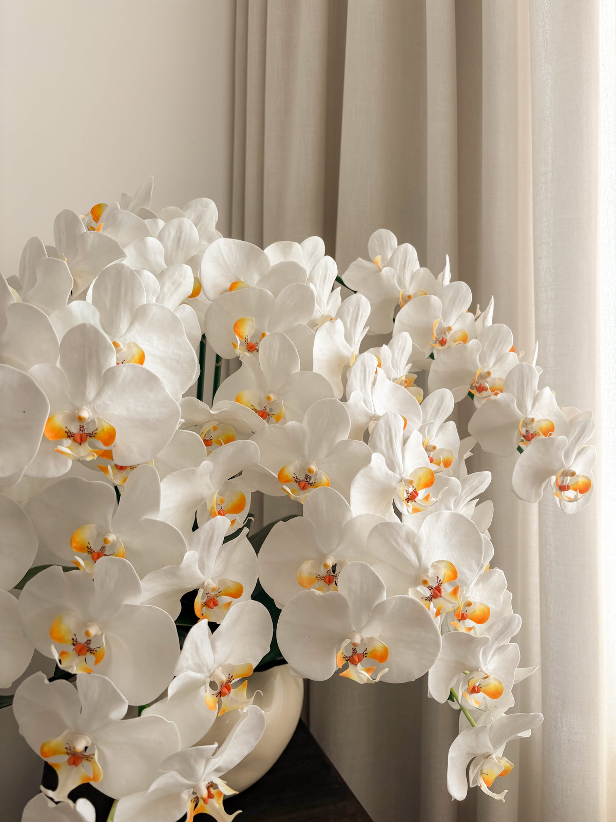Detail view: extra large artificial white orchid arrangement by FAUX Dubai