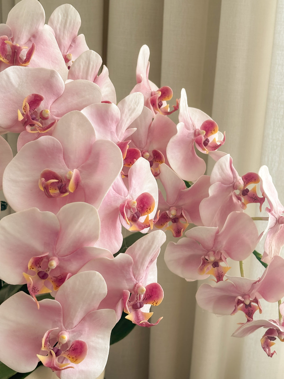 Detail view: blush pink artificial orchids by FAUX Dubai